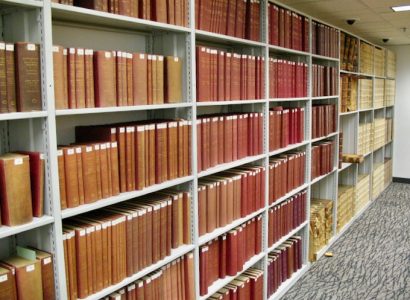 IS YOUR BOOK PROTECTED BY AN OFFICIAL COPYRIGHT? These Library of Congress shelves hold paper copyright certificates bound into hardback volumes for the permanent archive.